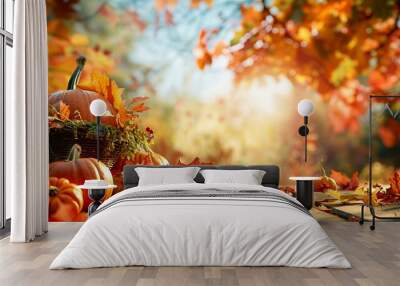 Autumn harvest with pumpkins, apples, and leaves on a wooden table with a blurred background of a fall forest. Wall mural