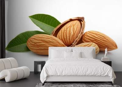 Four almonds with two green leaves isolated on white. Wall mural