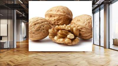 Three walnuts in their shells with one cracked open, showcasing the edible nut inside. Wall mural