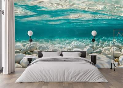 Underwater view of crystal clear turquoise water with white pebbles on the bottom. Wall mural