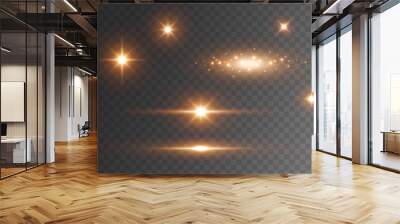 Star burst with sparkles isolated on transparent background. Sun flash with rays or gold spotlight set. Glow  flare light effect. Wall mural