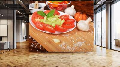 sliced tomatoes with celery, garlic pepper for a healthy snack with free space for text Wall mural