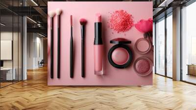 Various pink makeup products on a pink background Wall mural