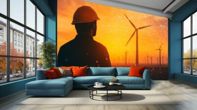 Silhouette of a wind turbine engineer with digital schematics and energy lines flowing through wind farm landscapes Wall mural