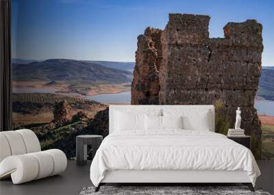 Ruins of the Giribaile castle on top of a hill overlooking the reservoir, second photo. Photography made in Jaen, Andalusia, Spain. Wall mural