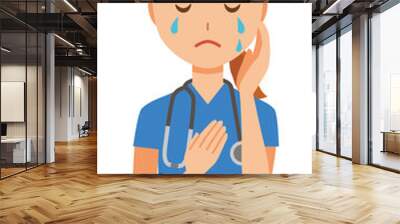 A woman nurse wearing a blue scrub is crying Wall mural