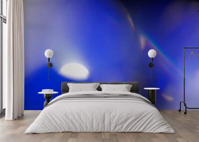 Real optical blue bokeh on black background Wall mural