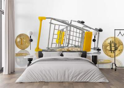 Full of gold bitcoins cryptocurrency in shopping cart fell down- virtual cryptocurrency concept- isolated on white background. Wall mural