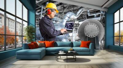 engineer using laptop computer in thermal power plant factory Wall mural