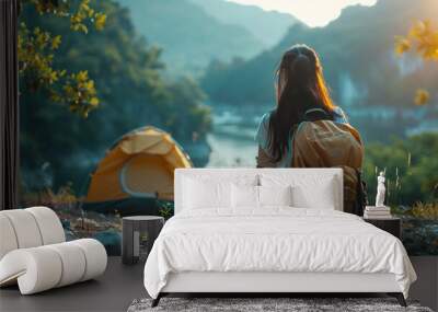 Asian woman travel and camping alone at natural park in Thailand. Recreation and journey outdoor activity lifestyle. Good morning and fresh start of the day.  Wall mural