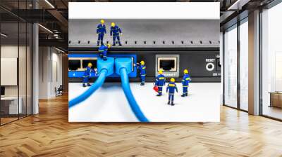 Group of engineers connecting fiber network cables Wall mural