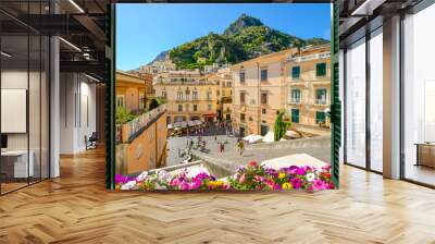 View from an open window with shutters over the steps, Piazza Duomo, and colorful old town of Amalfi, Italy, on the Amalfi Coast. Wall mural