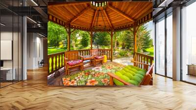 View of a wooden gazebo in the landscaped garden of an upscale home. Wall mural