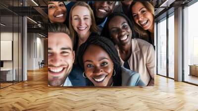  Cheerful diverse group of coworkers taking a selfie in an office environment, showcasing teamwork and camaraderie. Wall mural