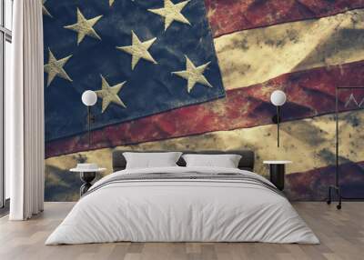 American flag with stars waving boldly against a clear blue sky. Wall mural