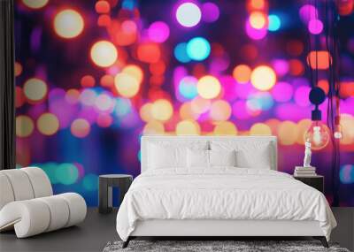 Colorful lights blur in motion against a dark background, creating a vibrant and dynamic visual display. Wall mural