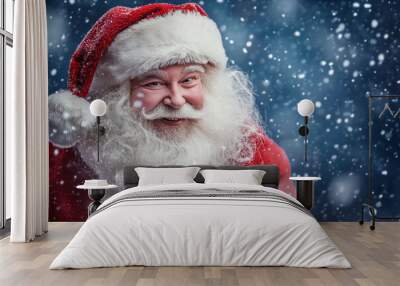 Santa Claus with snow-covered face, smiling brightly in winter wonderland. Wall mural