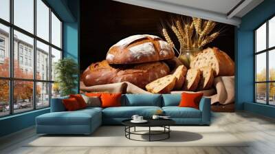 Sourdough bread loaf and ciabatta roll, freshly baked, gluten-rich wheat-based baked goods, Black and Brown dominant colors. Wall mural