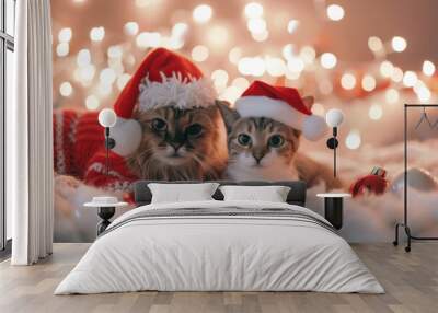 two adorable cats dressed in festive santa hats and sweaters, nestled among twinkling christmas ligh Wall mural