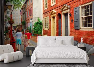 A family strolls down Elfreth's Alley, Philadelphia, the oldest street in continuous use in the United States Wall mural