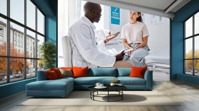 Doctor consulting patient for covid vaccine, wellness check and medical test results in clinic surgery. Healthcare worker and hospital staff in discussion about medicine service and healthy feedback Wall mural