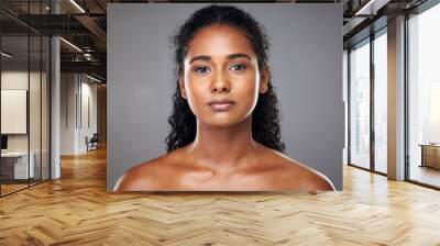 Face, beauty and skincare of a woman from India with glowing, wellness and skin health. Portrait of a young Indian person after a cosmetic, dermatology of glowing body treatment looking radiant Wall mural