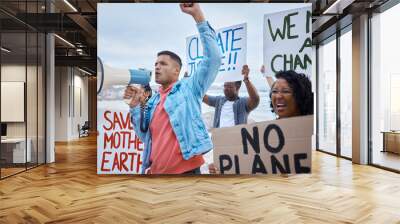 Protest, global warming and megaphone with man at the beach for environment, earth day and action. Climate change, community and pollution with activist for social justice, support and freedom Wall mural