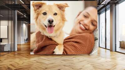 Hes all I need. Shot of a beautiful young woman relaxing on the couch with her dog at home. Wall mural