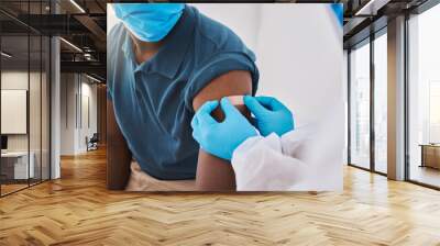 Hospital nurse, covid vaccine flu shot and patient with mask, bandage plaster arm, medical doctor or healthcare professional worker. Coronavirus epidemic and disease control by medical expert. Wall mural