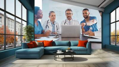 Medical meeting, research and doctors planning healthcare innovation in a seminar at a hospital. Group of medicine workers talking about strategy on the web while working at a clinic together Wall mural