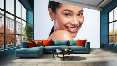 Woman, skincare and beauty in studio portrait with smile, happiness or natural glow on skin by white background. Girl, model and happy for makeup, cosmetics or youth with wellness, aesthetic or shine Wall mural