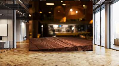 Empty brown wooden table and blur background of abstract of resturant lights people enjoy eating ,can be used for montage or display your products Wall mural