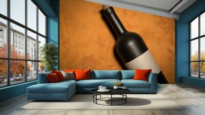 Glass bottle of wine with corks on wooden table background Wall mural