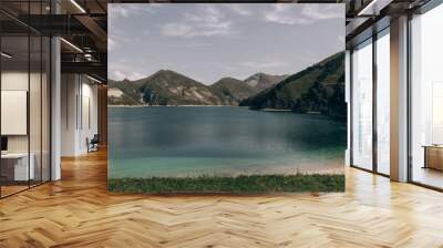 A beautiful lake in the mountains, on the border of Chechnya and Dagestan in Russia Wall mural