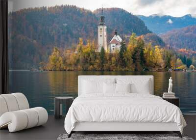 Beautiful autumn landscape around Lake Bled with Pilgrimage Church of the Assumption of Maria Wall mural