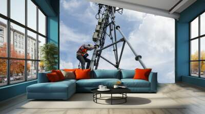 engineer working on high telecom tower,Maintenance conceptual photo Wall mural