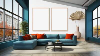 Blank frame mockup in modern interior design with vase and trendy plants on empty white wall background, Two vertical templates for paintings, photos or posters. Artwork mock-up Wall mural