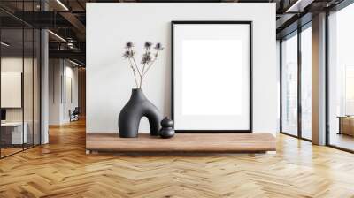 Blank picture frame mockup on white wall. White living room design. View of modern scandinavian style interior with artwork mock up on wall. Home staging and minimalism concept Wall mural