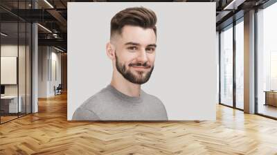 Closeup portrait of handsome smiling young man. Laughing joyful cheerful men studio isolated shot Wall mural