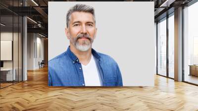 Handsome smiling mature man closeup isolated portrait. Cheerful middle age man looking at camera. Male beauty, senior lifestyle, people concept Wall mural