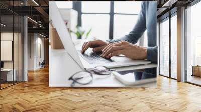 Man hands typing on computer keyboard closeup, businessman or student using laptop at office, online learning, internet marketing, working from home, office workplace freelance concept Wall mural