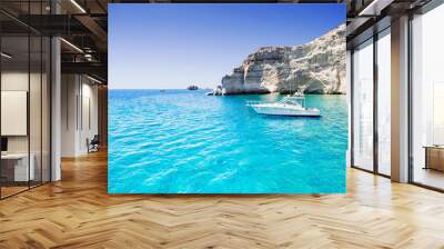 sailboat in a beautiful bay, milos island, greece Wall mural