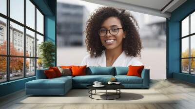 Young beautiful woman portrait, African student girl in a city, Young businesswoman smiling outdoor, People, enjoy life, student lifestyle, city life, business concept Wall mural