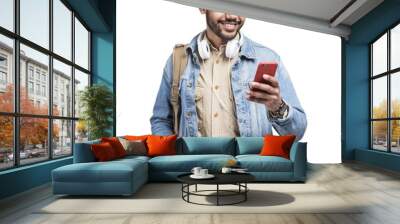 Young handsome man with backpack looking at smart phone and holding coffee cup isolated transparent PNG, Smiling student going on travel Wall mural