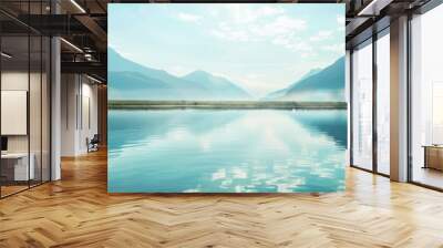 Serene mountain lake with clear reflection of peaks and a bright sky, perfect for nature, outdoor, and landscape themed projects. Wall mural