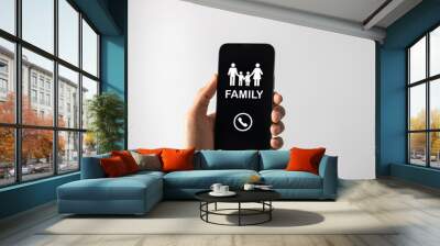 work life balance and importance relationship concept. man holding mobile phone and calling to family. Wall mural