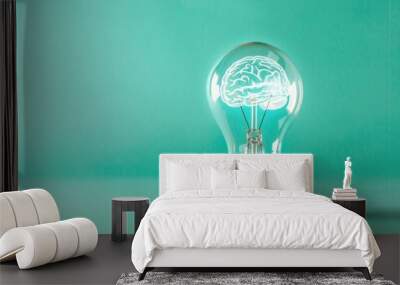 A light bulb emitting a brain hologram, set on a solid color background. The visual represents creativity and smart thinking, with ample copy space around it. Wall mural