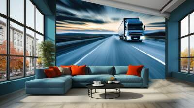 A transport truck captured speeding down an empty road, with motion blur highlighting its fast pace and efficient logistics operations Wall mural