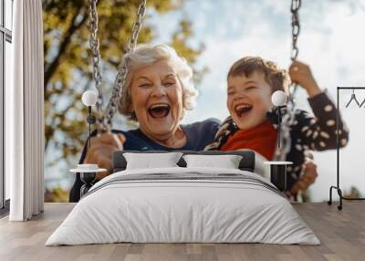 High-resolution brightly lit photorealistic candid photograph of a grandmother and grandchild enjoying a sunny day at a neighborhood playground, swinging and laughing together. The photograph is Wall mural