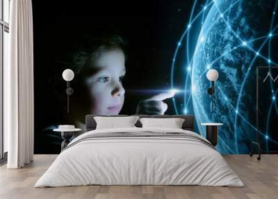 little girl touches a virtual world with multimedia connections. concept of future and communication with the digital world. Wall mural